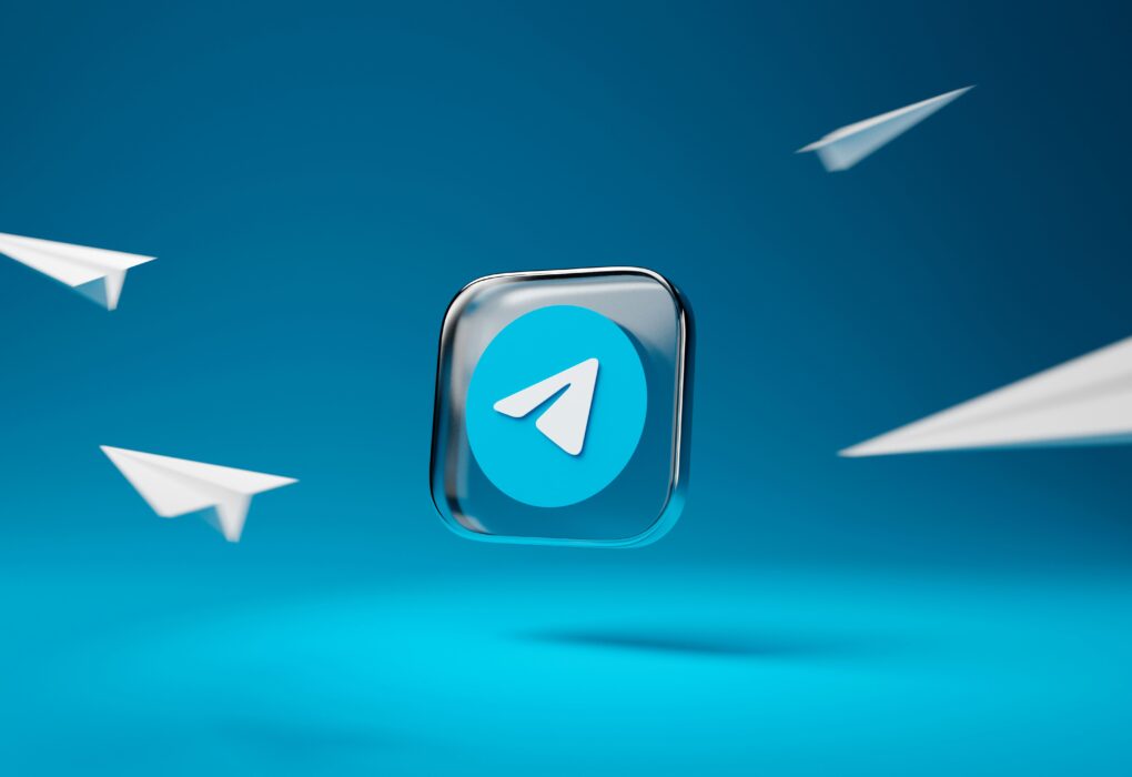 “Telegram logo and paper planes representing PYT Telegram channel growth and online earning”