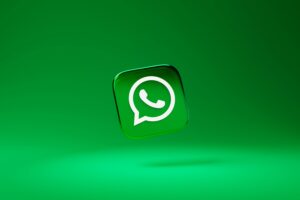 The image you provided features the WhatsApp logo on a clean green background. It depicts a floating icon of the WhatsApp logo, with the signature green color and the white speech bubble design.